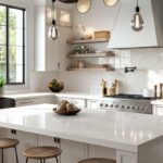 n image showcasing a beautifully renovated kitchen that epitomizes modern design trends, featuring elements such as light-colored cabinets, sleek quartz countertops, open shelving, and minimalist hardware.